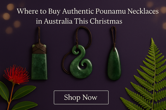 Kiwi Christmas hero image featuring authentic pounamu pendants (toki, koru and roimata) with cords, surrounded by pōhutukawa flowers and fern leaves on a dark purple background, with a Shop Now button.