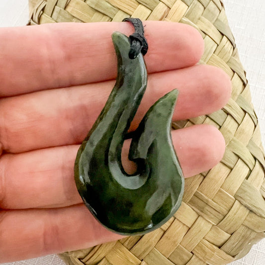 NZ greenstone hook pendant 50mm on adjustable cord – authentic pounamu necklace symbolising strength and safe travels