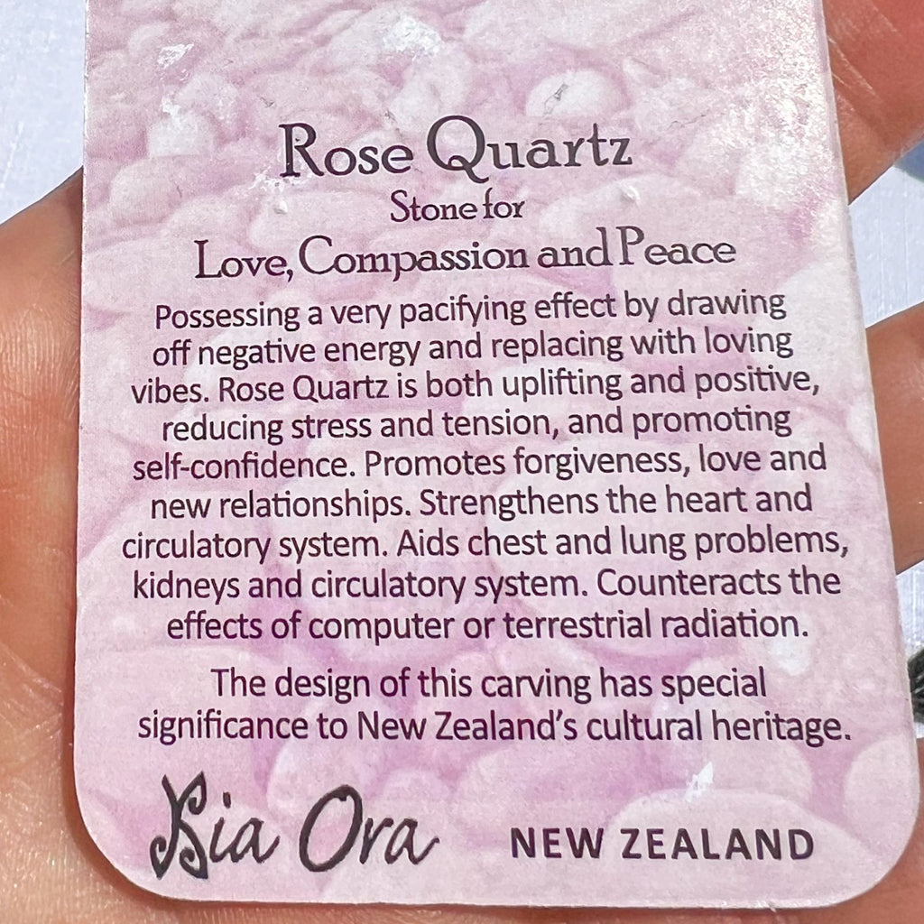 Close-up of a Rose Quartz meaning card from Aotearoa New Zealand, describing the stone as one for love, compassion, and peace, promoting forgiveness, self-confidence, and calm energy.