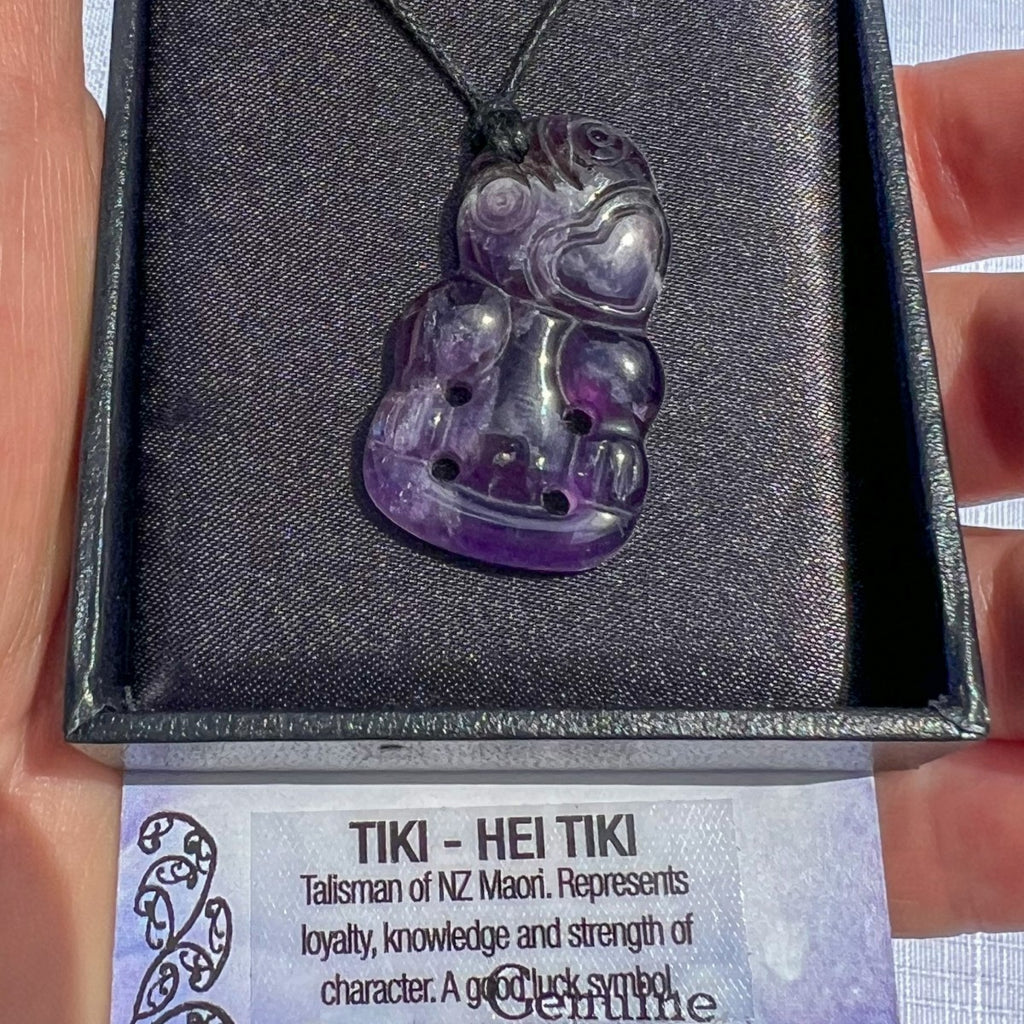 Amethyst Hei Tiki pendant necklace carved from purple crystal, symbolising loyalty, knowledge, and strength — New Zealand Māori talisman.