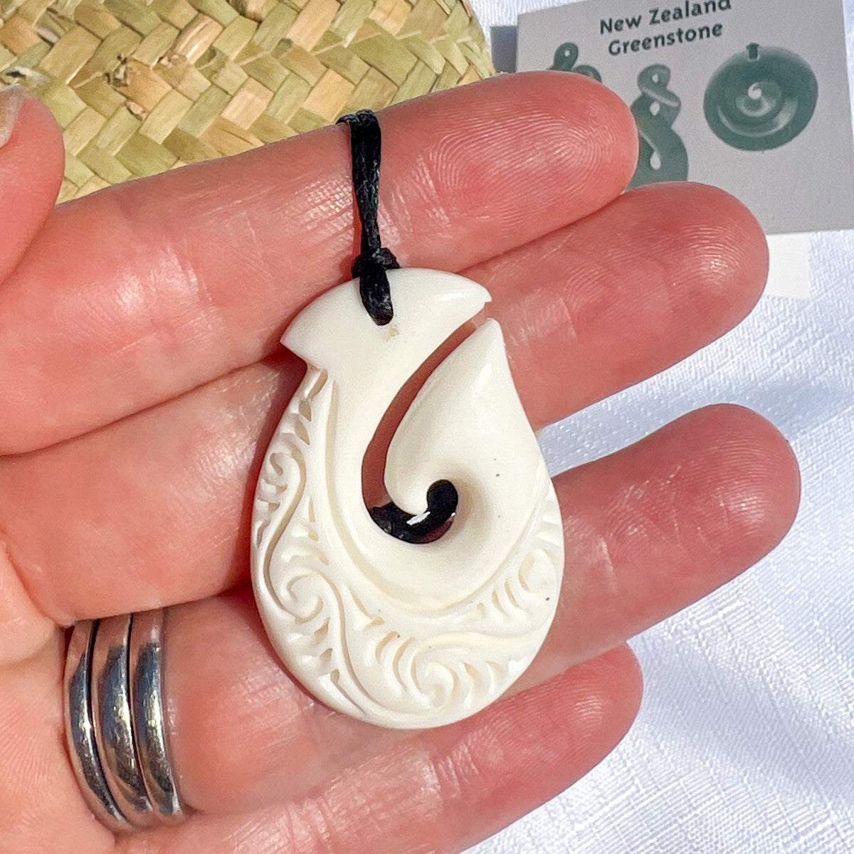 34mm bone hook pendant hand-carved from bovine bone – Māori hei matau design symbolising strength, prosperity, and safe journeys. Includes kete and meaning card. Ships fast from Australia. Free shipping on orders over $100.