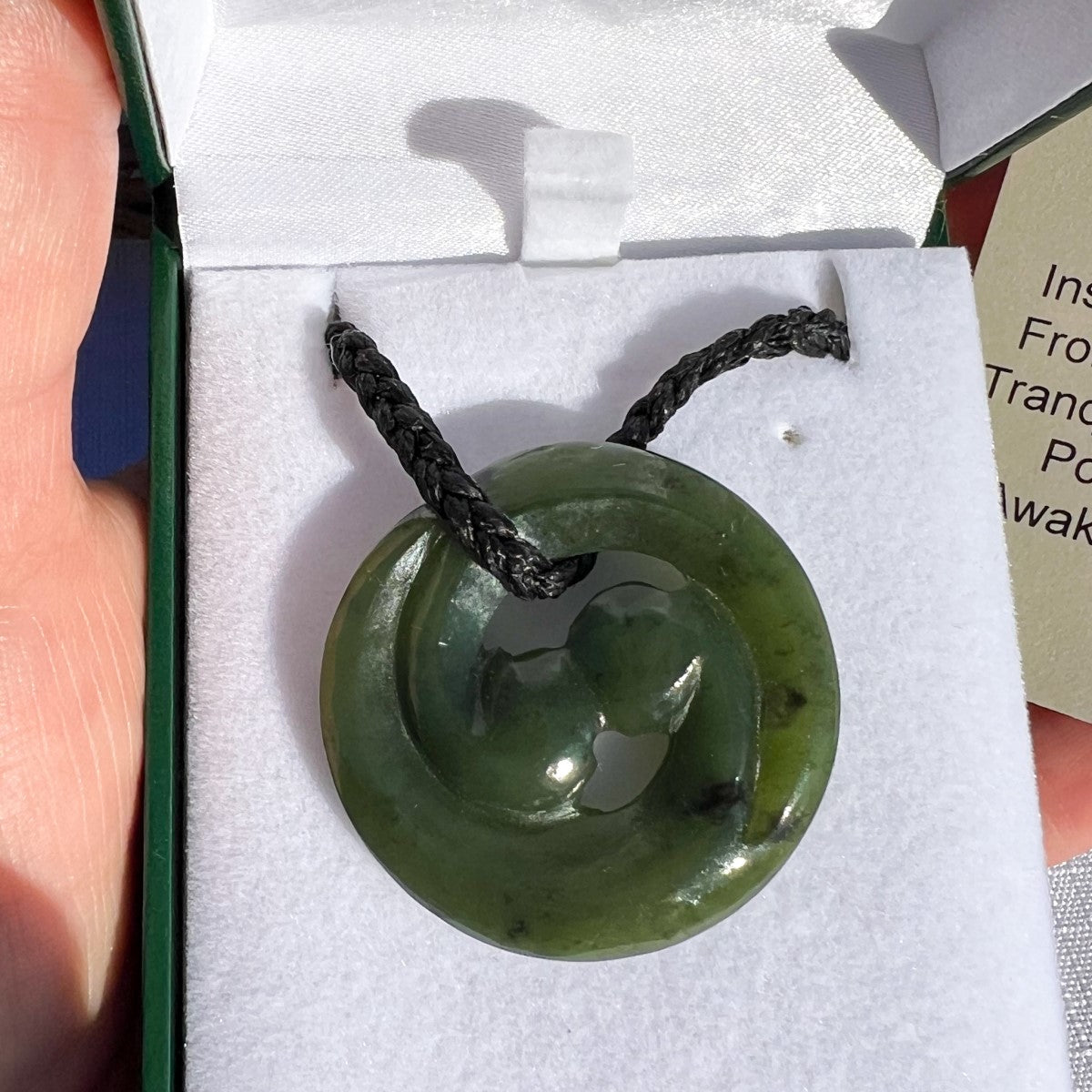 34mm New Zealand greenstone closed koru pendant – genuine pounamu symbolising life, unity, and renewal. Presented in gift box with meaning card. Ships fast from Australia. Free shipping included.