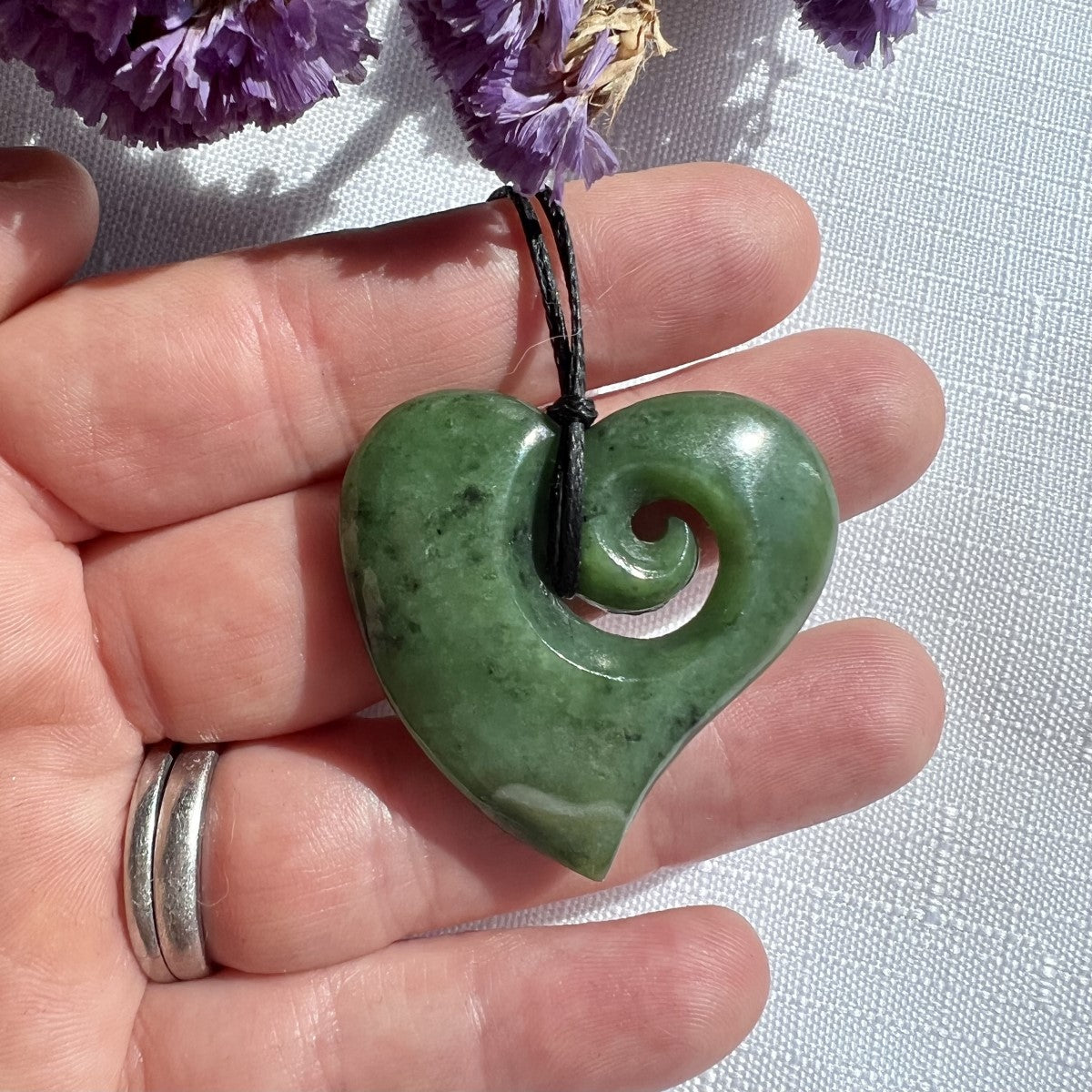35mm New Zealand greenstone heart koru necklace – genuine pounamu symbolising love, growth, and harmony. Adjustable cord. Includes kete and meaning card. Ships fast from Australia. Free shipping automatically included.