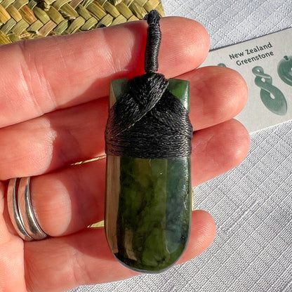 45mm New Zealand greenstone pendant with adjustable cord – genuine pounamu hand-carved in NZ. Includes kete and meaning card. Ships fast from Australia. Free shipping included.