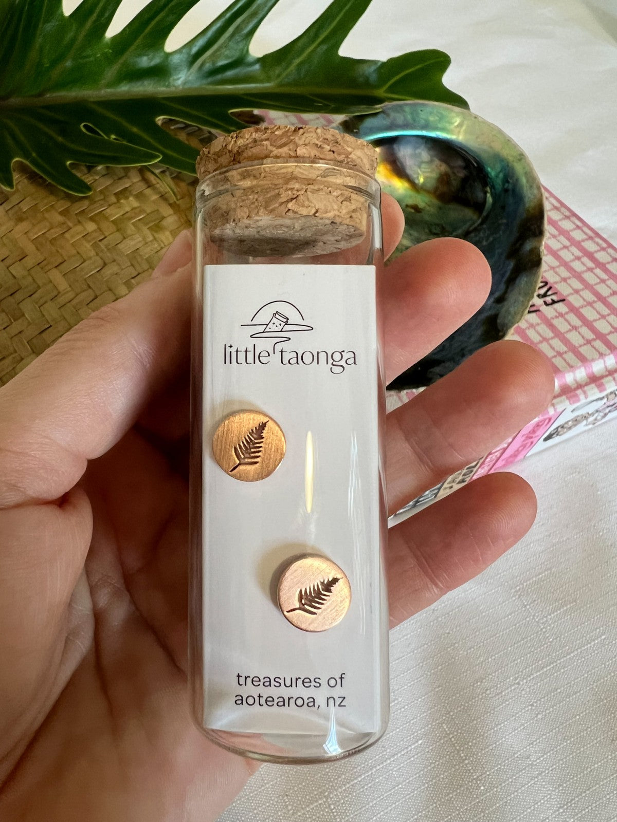 Rose gold silver fern stud earrings by Little Taonga in glass gift bottle – New Zealand symbol jewellery