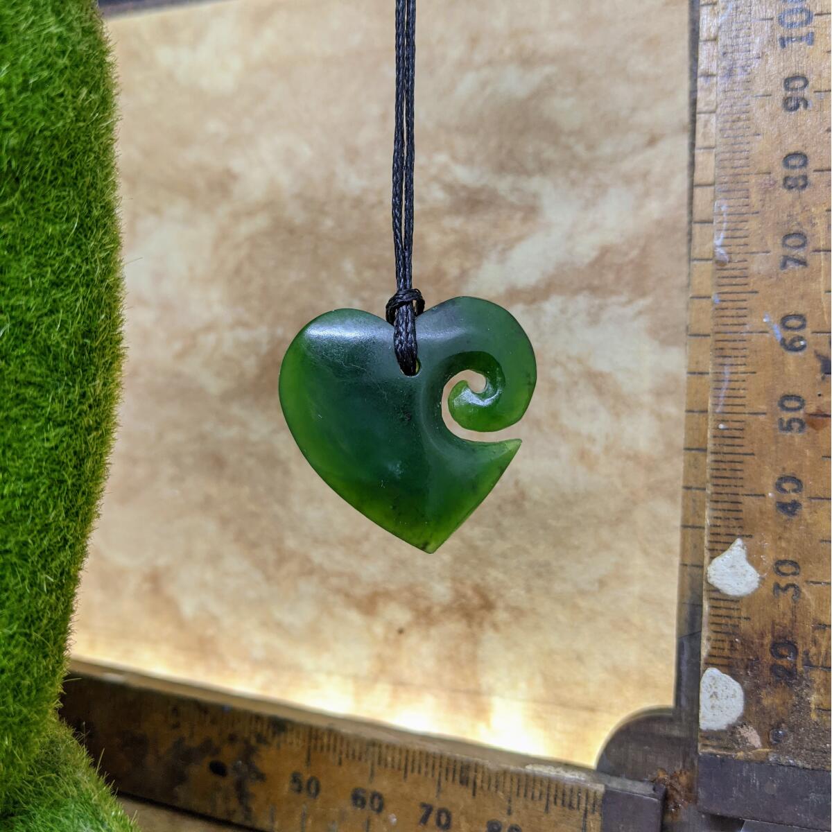 30mm New Zealand greenstone heart koru necklace – genuine pounamu symbolising love, connection, and renewal. Adjustable cord. Includes kete and meaning card. Ships fast from Australia. Free shipping on orders over $100.