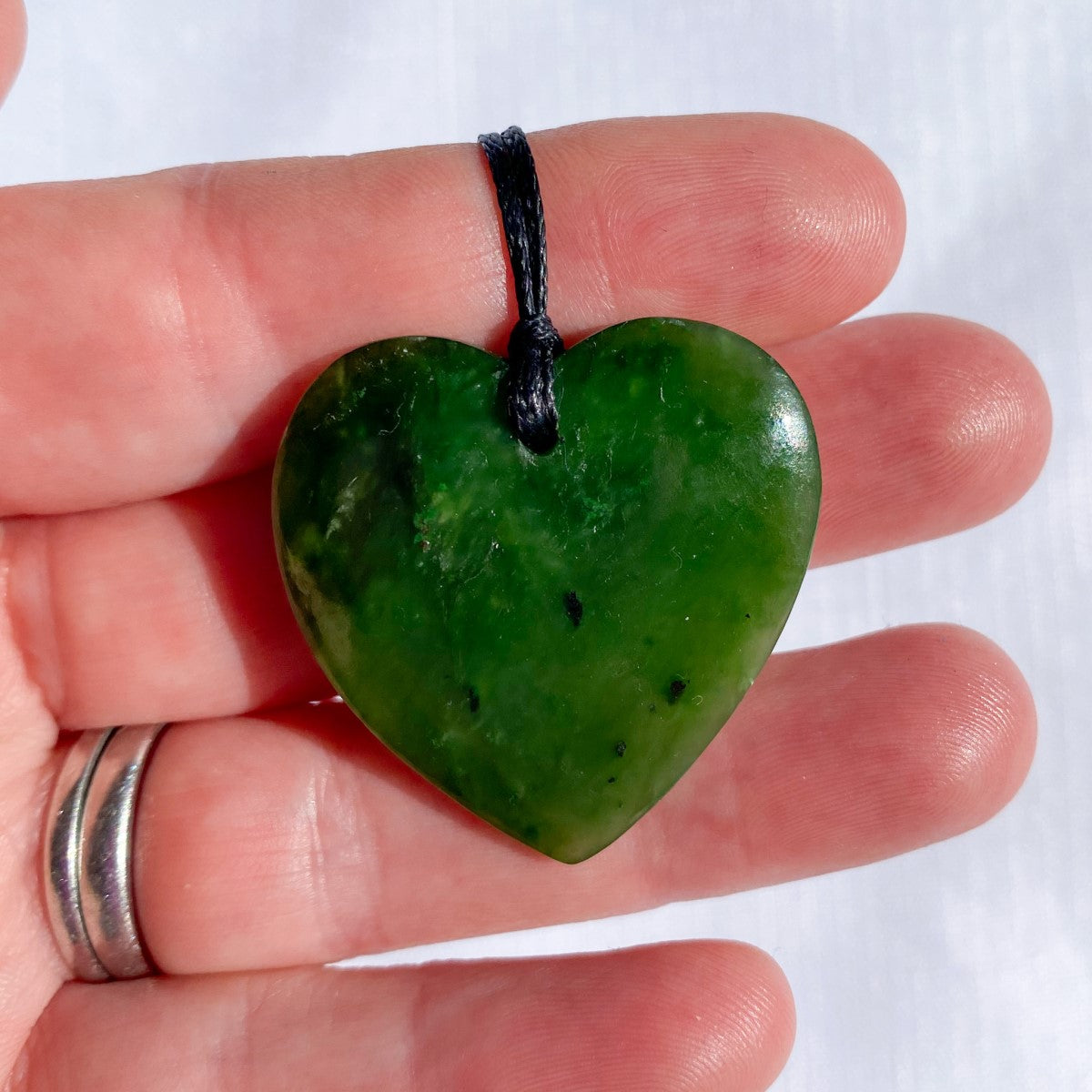 30mm New Zealand greenstone heart necklace – genuine pounamu symbolising love, compassion, and connection. Includes kete and meaning card. Adjustable cord. Ships fast from Australia. Free shipping on orders over $100.