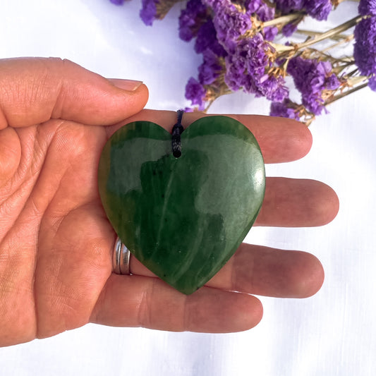 50mm New Zealand greenstone heart necklace – genuine pounamu symbolising love, compassion, and unity. Adjustable cord. Includes kete and meaning card. Ships fast from Australia. Free shipping automatically included.