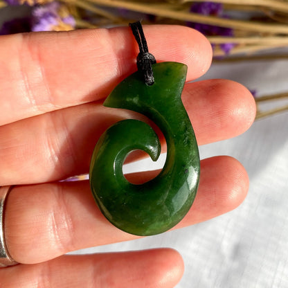 43mm New Zealand greenstone hook necklace – genuine pounamu hei matau design symbolising strength, prosperity, and safe journeys. Adjustable cord. Ships fast from Australia. Free shipping over $100.