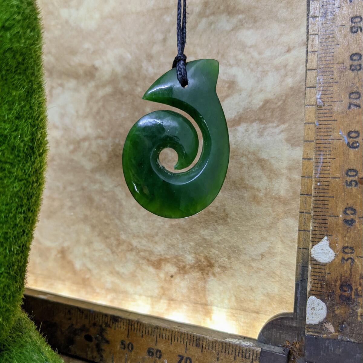 43mm New Zealand greenstone hook necklace – genuine pounamu hei matau design symbolising strength, prosperity, and safe journeys. Adjustable cord. Ships fast from Australia. Free shipping over $100.