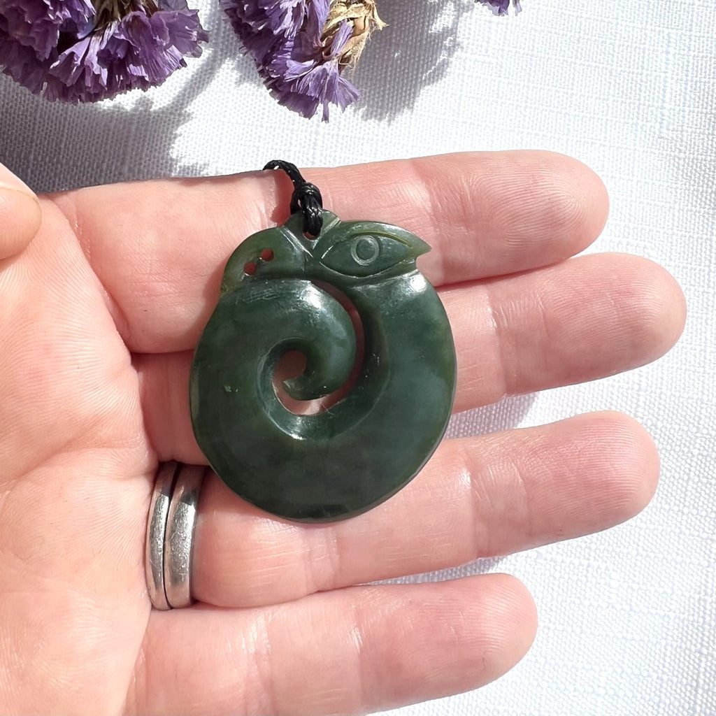 35mm New Zealand greenstone koropepe necklace – genuine pounamu symbolising protection, strength, and spiritual guidance. Adjustable cord. Ships fast from Australia. Free shipping over $100.