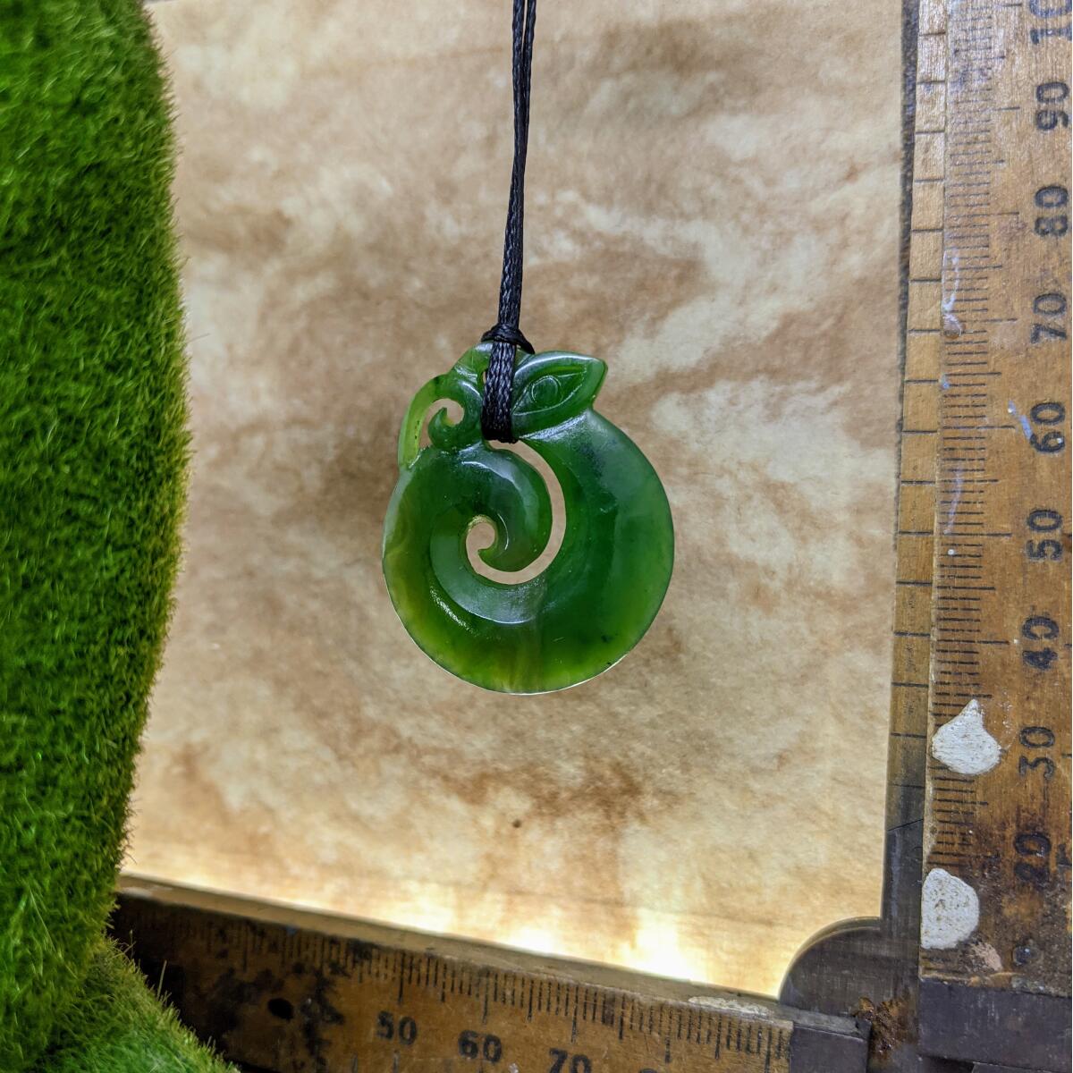 35mm New Zealand greenstone koropepe necklace – genuine pounamu symbolising protection, strength, and spiritual guidance. Adjustable cord. Ships fast from Australia. Free shipping over $100.