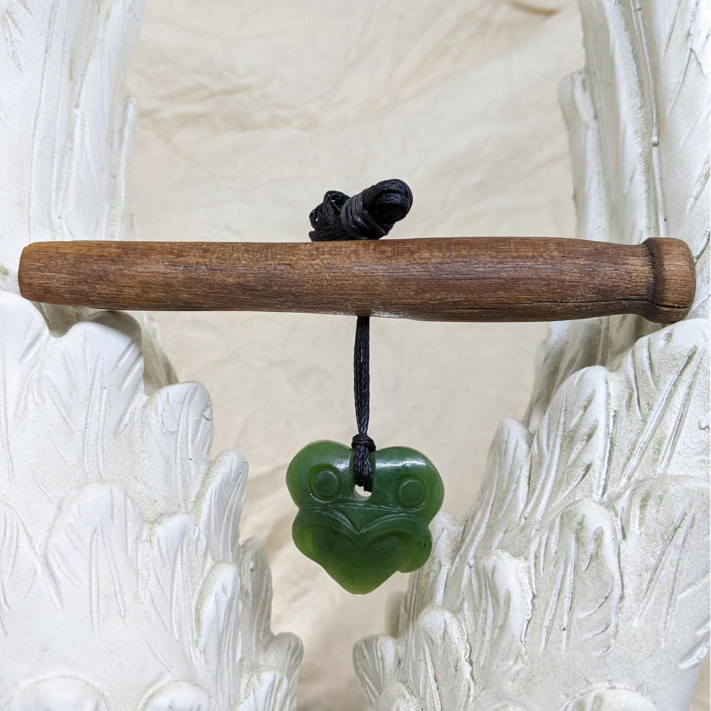 25mm New Zealand greenstone tiki pendant with adjustable cord – genuine pounamu. Ships fast from Australia. Free shipping over $100.