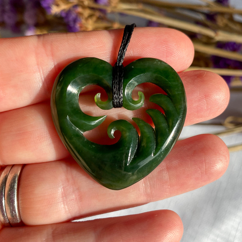 35mm New Zealand greenstone wave heart necklace – genuine pounamu symbolising love, friendship, and connection to the sea. Adjustable cord. Ships fast from Australia. Free shipping over $100.