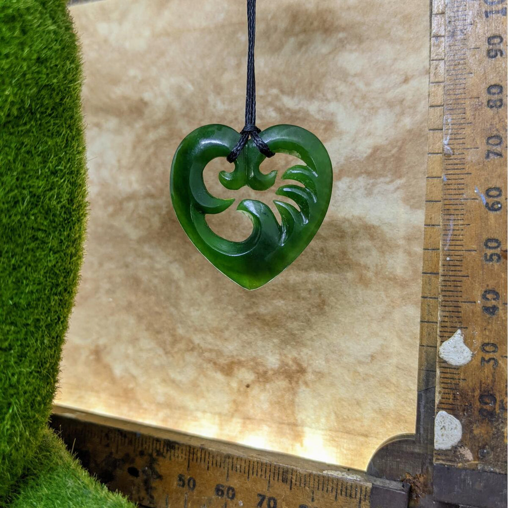 35mm New Zealand greenstone wave heart necklace – genuine pounamu symbolising love, friendship, and connection to the sea. Adjustable cord. Ships fast from Australia. Free shipping over $100.